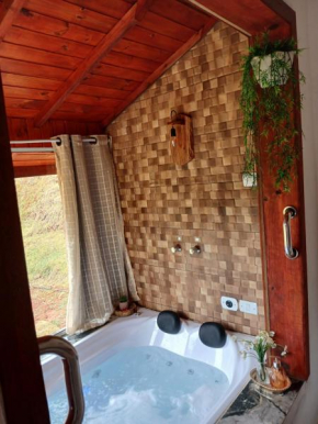 Chalé monte verde com hidromassagem